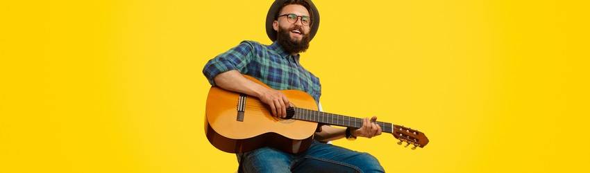 man-playing-acoustic-guitar