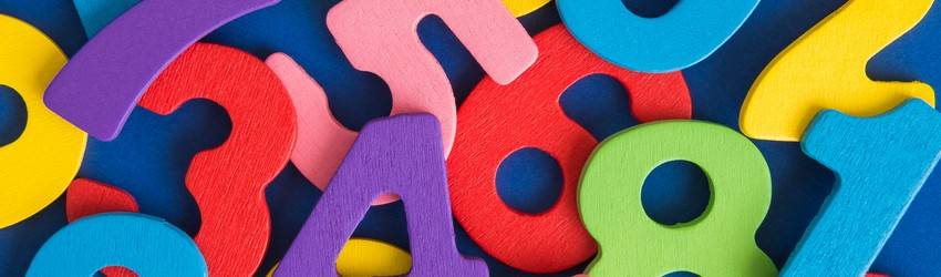 magnets-on-a-table-in-the-shape-of-different-numbers