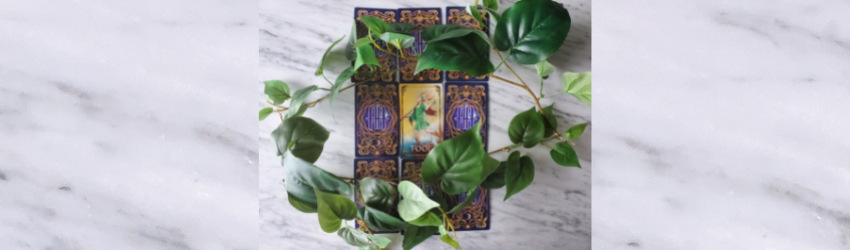 A nine-card sample Tarot spread featuring 3 rows of 3 cards.